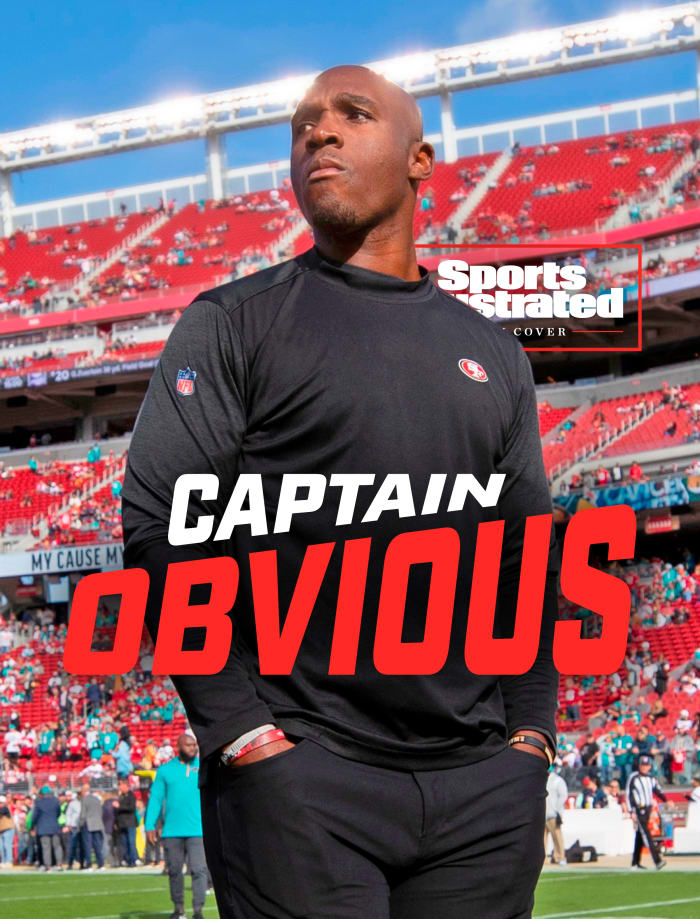 DeMeco Ryans walks the field before a 49ers game against the Dolphins